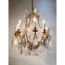 IQ4499 EARLY 20TH CENTURY FRENCH EIGHT ARM ROCK CRYSTAL AND GILT BRONZE CHANDELIER