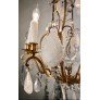 IQ4499 EARLY 20TH CENTURY FRENCH EIGHT ARM ROCK CRYSTAL AND GILT BRONZE CHANDELIER