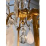 IQ4499 EARLY 20TH CENTURY FRENCH EIGHT ARM ROCK CRYSTAL AND GILT BRONZE CHANDELIER