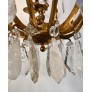IQ4499 EARLY 20TH CENTURY FRENCH EIGHT ARM ROCK CRYSTAL AND GILT BRONZE CHANDELIER