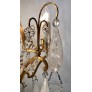 IQ4499 EARLY 20TH CENTURY FRENCH EIGHT ARM ROCK CRYSTAL AND GILT BRONZE CHANDELIER